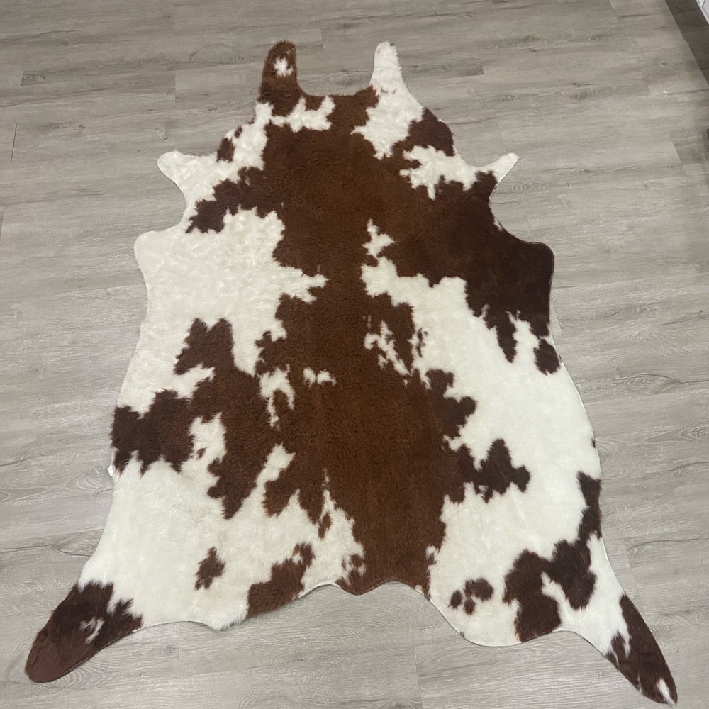 Brown and White Cowhide Rug